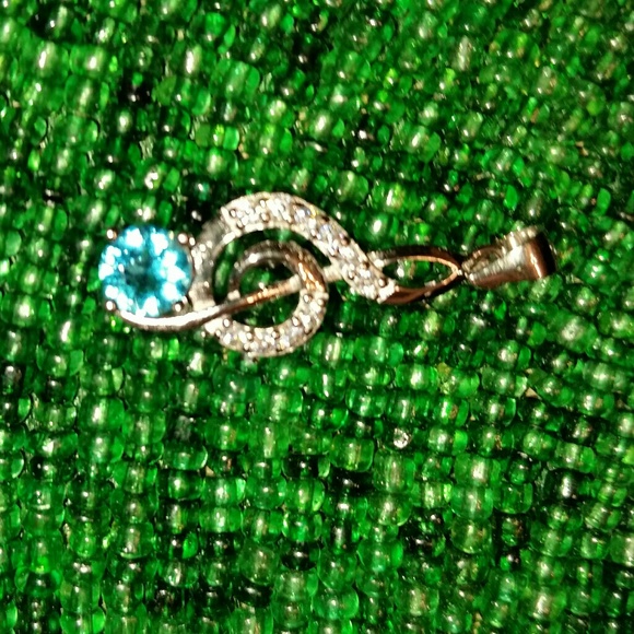 .925 Silver Treble Clef W & Swiss Blue Topaz Pend. - Picture 2 of 7